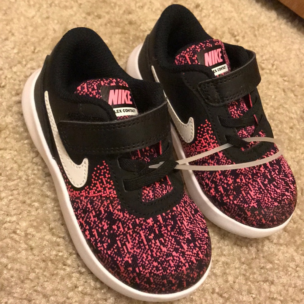 Pink and black Nike’s for toddlers